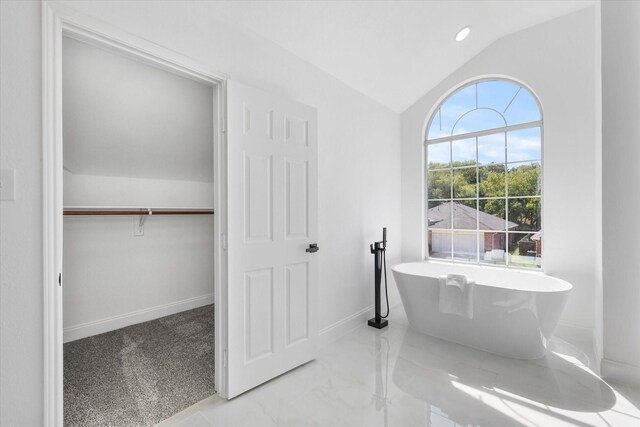 bathroom featuring a washtub