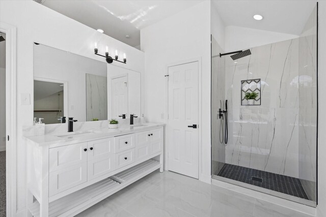 bathroom featuring vaulted ceiling and a bathtub