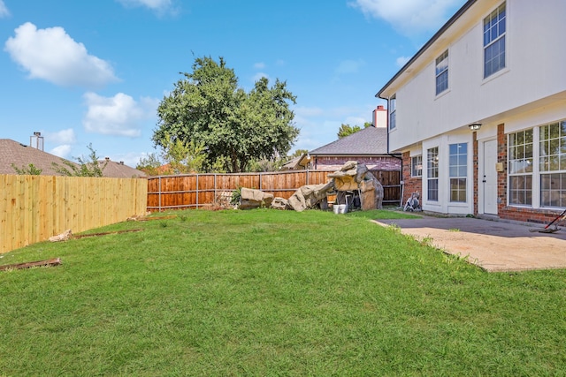 view of yard with a patio area