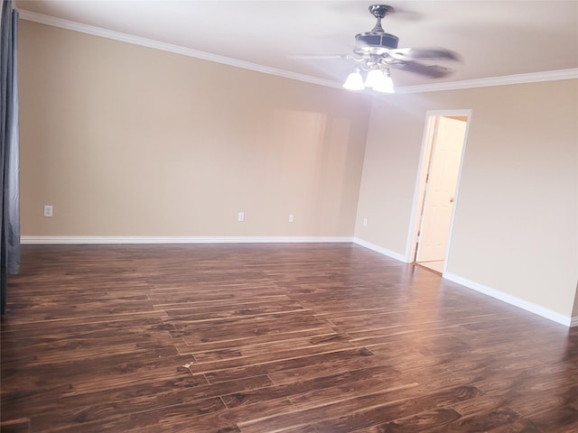 spare room with dark hardwood / wood-style floors, ceiling fan, and ornamental molding