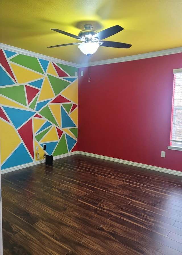 empty room featuring ceiling fan, dark hardwood / wood-style floors, and ornamental molding