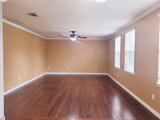 empty room featuring ceiling fan, dark hardwood / wood-style flooring, and ornamental molding