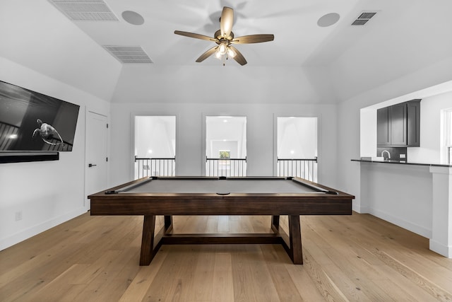 playroom with pool table, vaulted ceiling, ceiling fan, and light hardwood / wood-style flooring