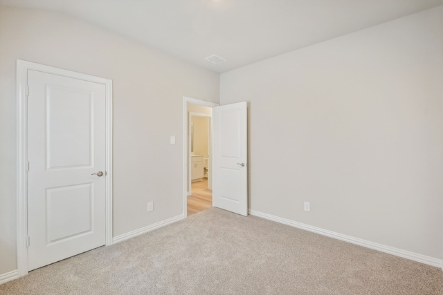 full bathroom with vanity, tiled shower / bath combo, toilet, and tile patterned floors