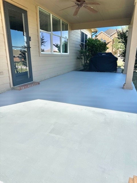 view of patio / terrace featuring ceiling fan