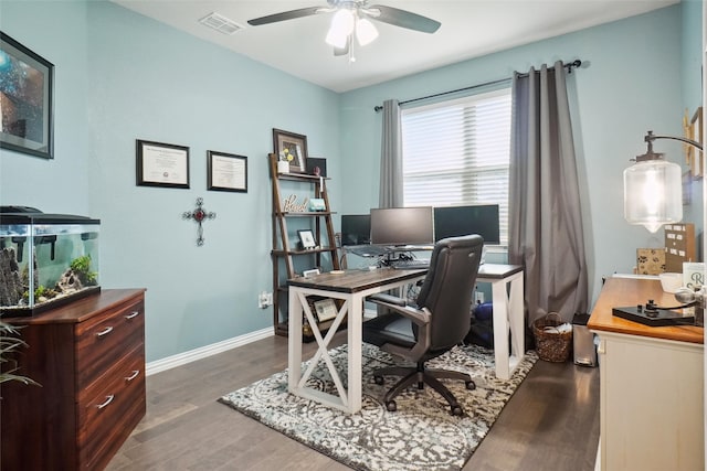 office featuring dark hardwood / wood-style flooring and ceiling fan