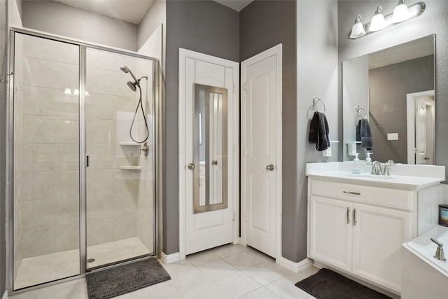 bathroom with vanity, plus walk in shower, and tile patterned floors