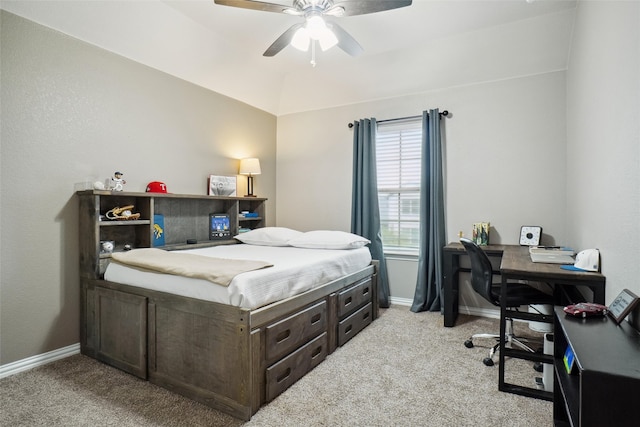 carpeted bedroom featuring lofted ceiling and ceiling fan