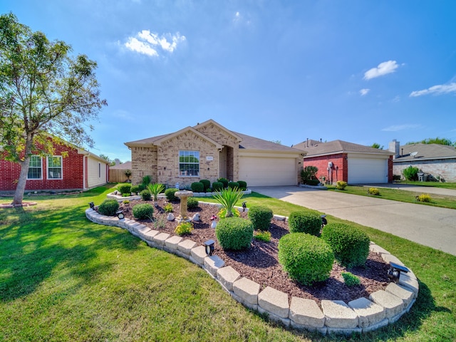 ranch-style home with a front yard and a garage