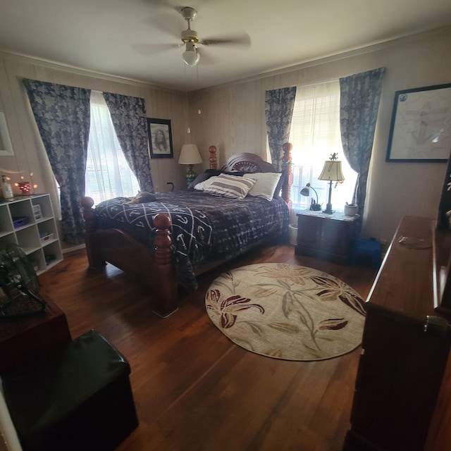 bedroom featuring ceiling fan and hardwood / wood-style floors