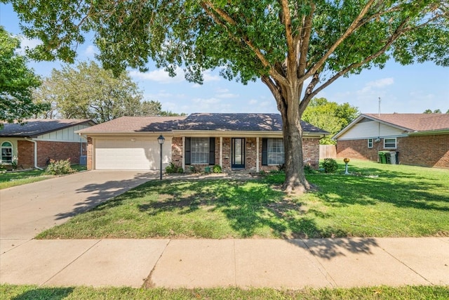 single story home with a garage and a front yard