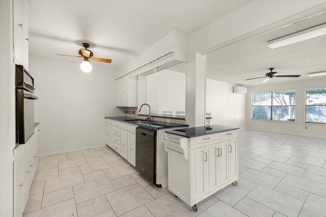 kitchen featuring white cabinetry, sink, black appliances, light tile patterned floors, and a textured ceiling