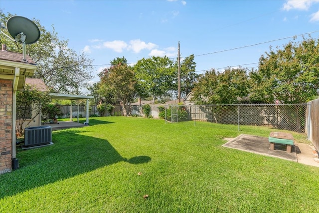 view of yard with a patio and cooling unit