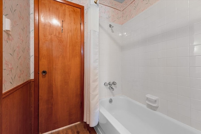 bathroom featuring shower / bath combination with curtain and wood-type flooring