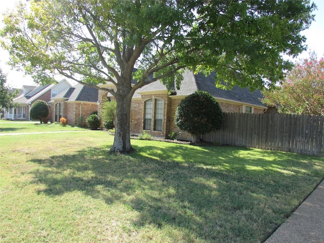 view of front of home with a front lawn