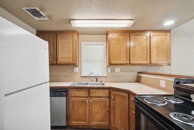 kitchen featuring black / electric stove, dishwasher, white fridge, tile counters, and sink