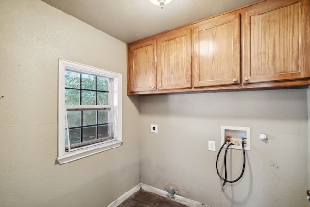 washroom featuring cabinets, hookup for an electric dryer, hookup for a gas dryer, and washer hookup