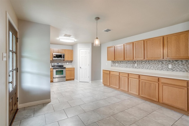 kitchen with pendant lighting, stainless steel appliances, light brown cabinets, and decorative backsplash