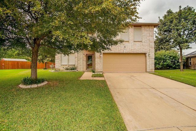 view of front of house with a front lawn and a garage