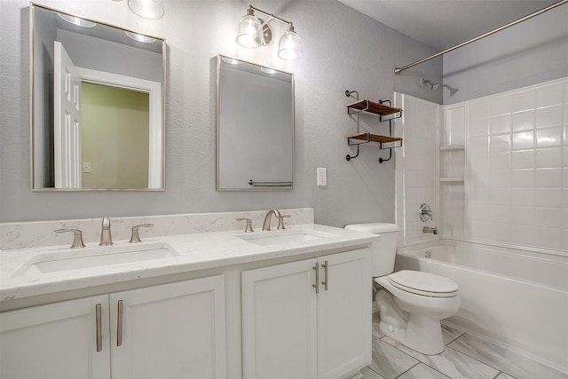 full bathroom with shower / bathing tub combination, vanity, and toilet