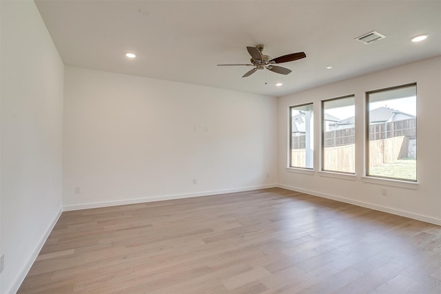 unfurnished room with light hardwood / wood-style floors and ceiling fan