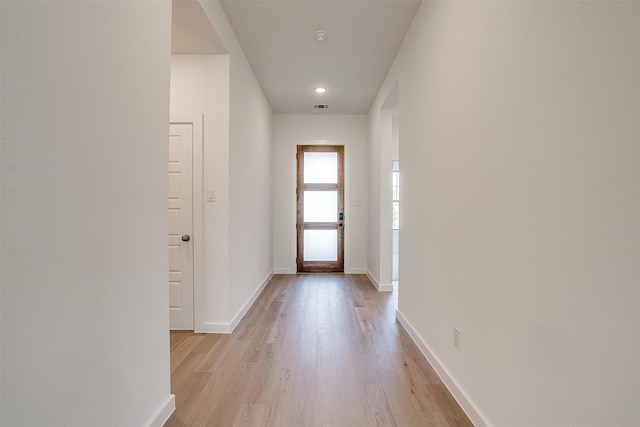 doorway featuring light hardwood / wood-style flooring