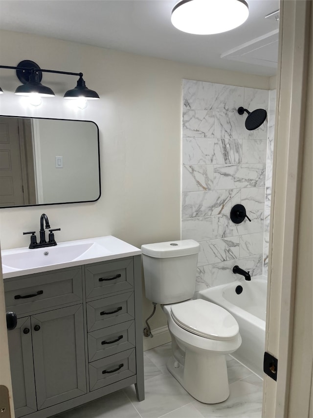 full bathroom with vanity, tiled shower / bath combo, and toilet