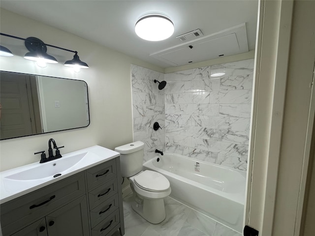 full bathroom with tiled shower / bath, vanity, and toilet