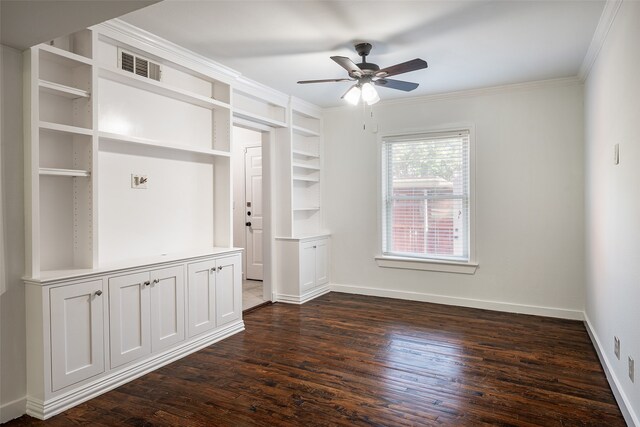 spare room with ornamental molding, ceiling fan, and dark hardwood / wood-style floors