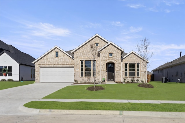 view of front of home with central AC, a garage, and a front lawn