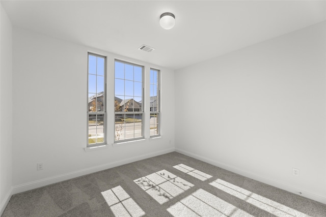 view of carpeted spare room