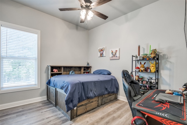 bedroom featuring ceiling fan and light hardwood / wood-style floors