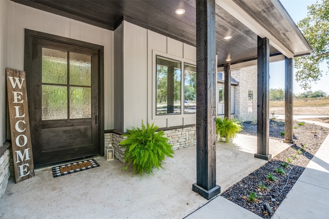 doorway to property with a porch