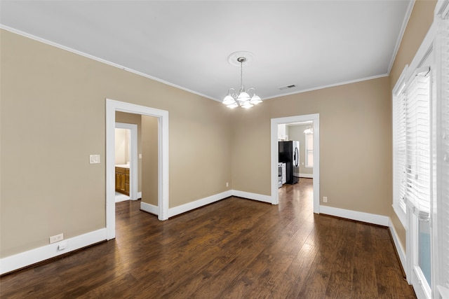 unfurnished dining area featuring crown molding, dark wood-type flooring, and plenty of natural light