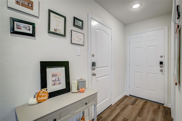 entryway with light hardwood / wood-style flooring