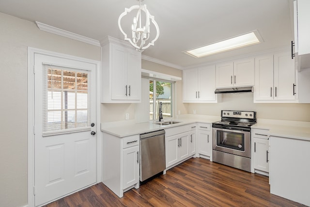 kitchen with white cabinetry, sink, plenty of natural light, pendant lighting, and appliances with stainless steel finishes