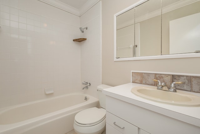 full bathroom featuring crown molding, toilet, decorative backsplash, vanity, and tiled shower / bath