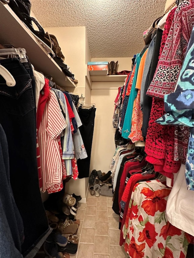 1402 Marie St N, Comanche, TX 76442 - walk in closet featuring tile patterned floors