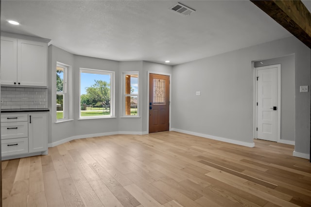 foyer featuring light hardwood / wood-style floors