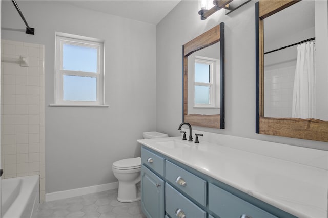 full bathroom with vanity, shower / tub combo with curtain, toilet, and tile patterned floors