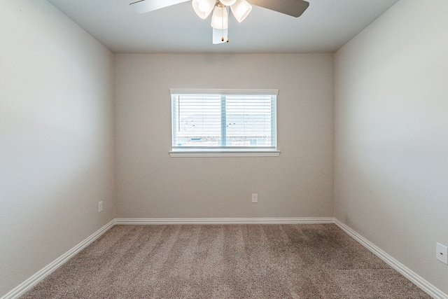 unfurnished room with carpet and ceiling fan