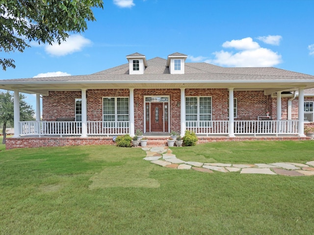 view of front of house featuring a front lawn and a porch