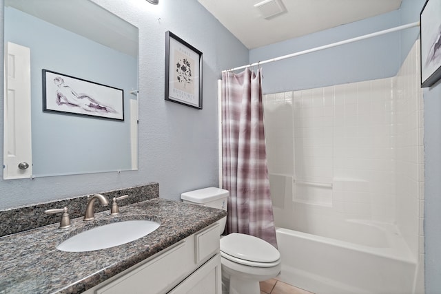 full bathroom with vanity, shower / tub combo, toilet, and tile patterned floors