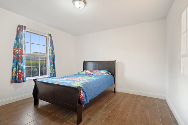 bedroom featuring hardwood / wood-style floors