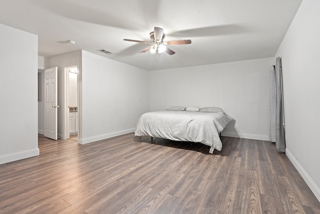 bedroom featuring dark hardwood / wood-style floors and ceiling fan