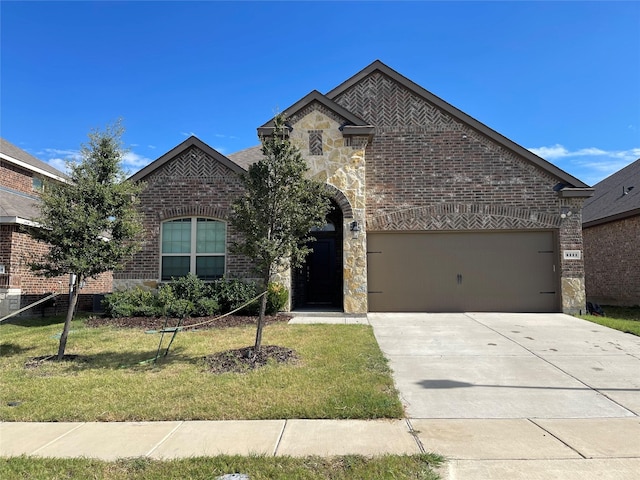 4111 Beamer Dr, Forney, TX 75126 - french country style house featuring stone siding, a garage, brick siding, a front lawn, and driveway