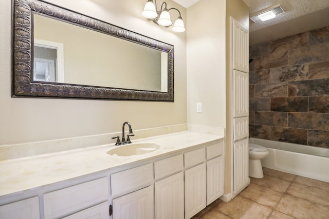 full bathroom featuring tub / shower combination, vanity, a textured ceiling, tile patterned flooring, and toilet