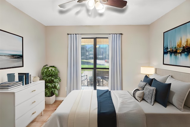 tiled bedroom with ceiling fan