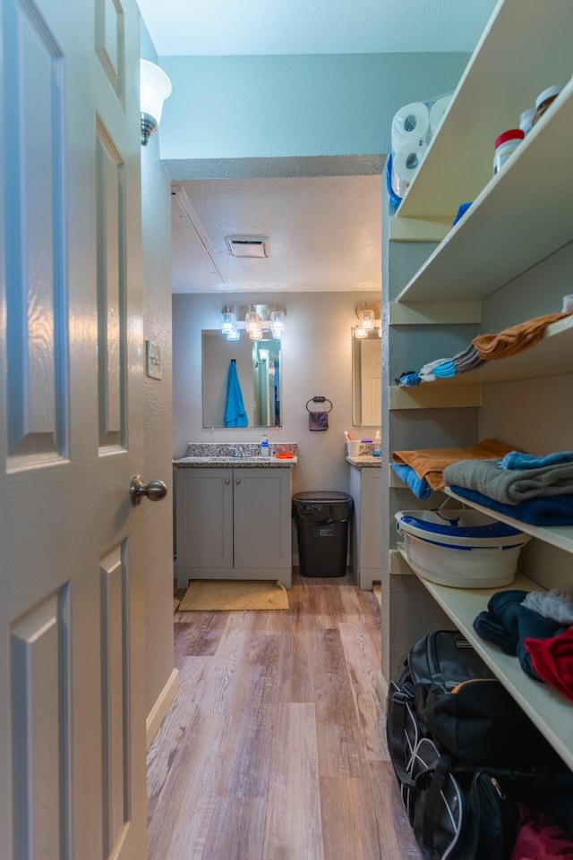 bathroom featuring hardwood / wood-style flooring