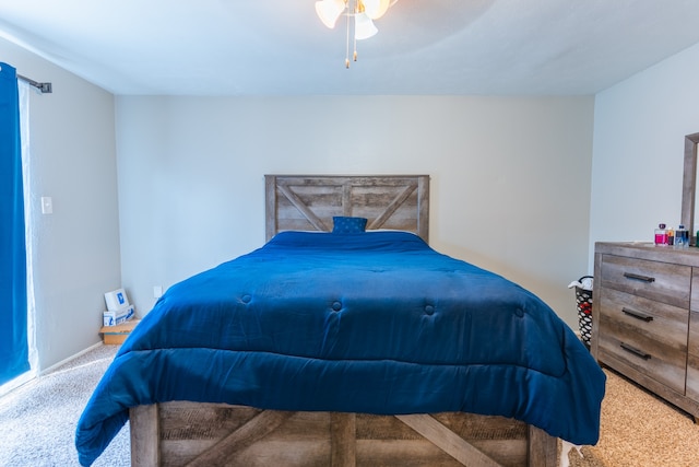 bedroom featuring carpet and ceiling fan